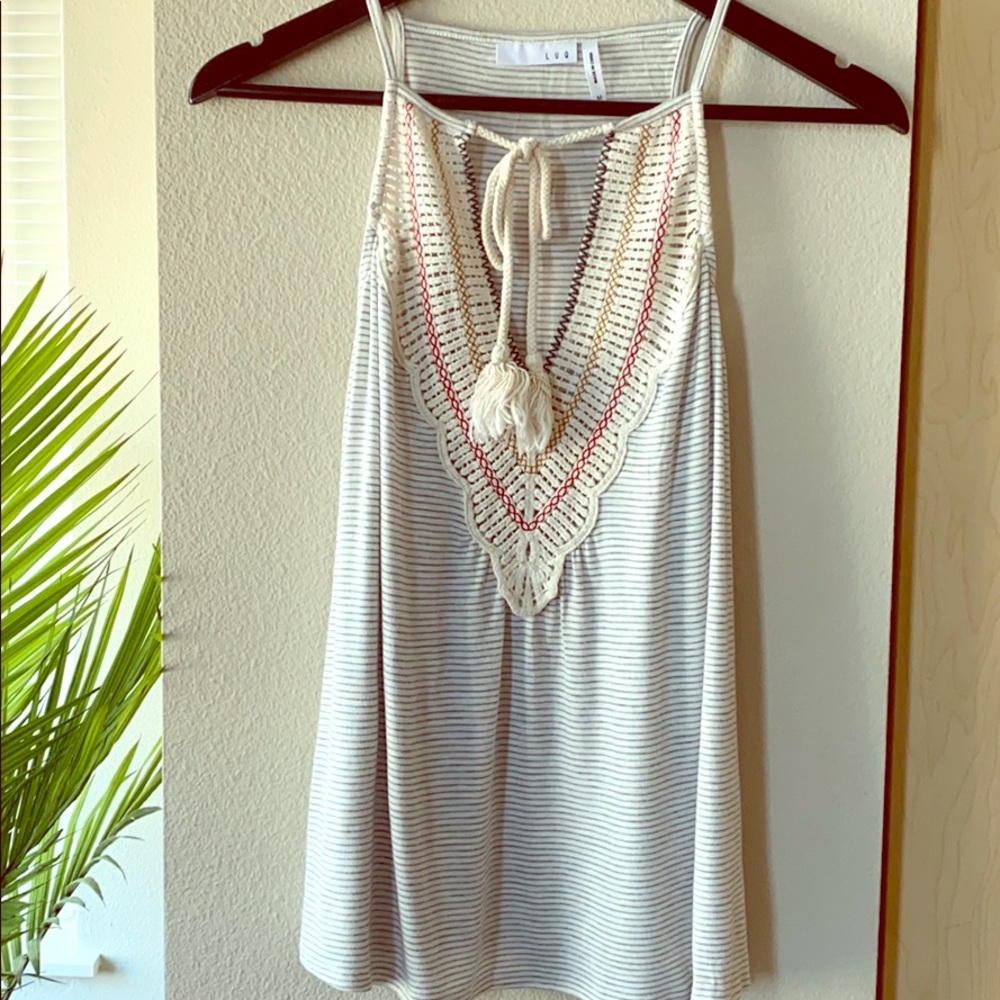 Striped shirt with tribal detail 🌱